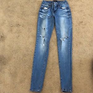 Celebrity Pink destroyed skinny jeans